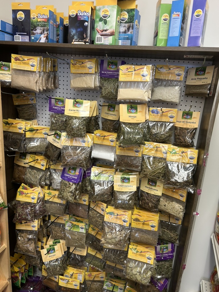 Packaged dried herbs and seasonings displayed in the shop