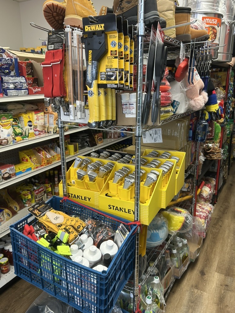 Work boots, tools, and construction gear displayed inside the market